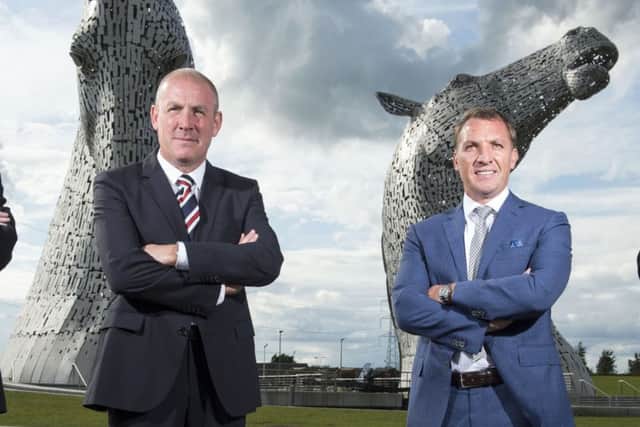 Rangers manager Mark Warburton and Celtic counterpart Brendan Rodgers have been urged to take the derby out of Scotland. Picture: Craig Williamson/SNS