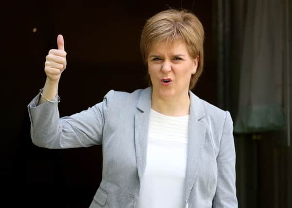 The overall UK result leaves Nicola Sturgeon with a headache as she seeks to reflect the undoubted anger that many SNP supporters feel at the prospect of Scotlands will being overturned by England. Picture: PA