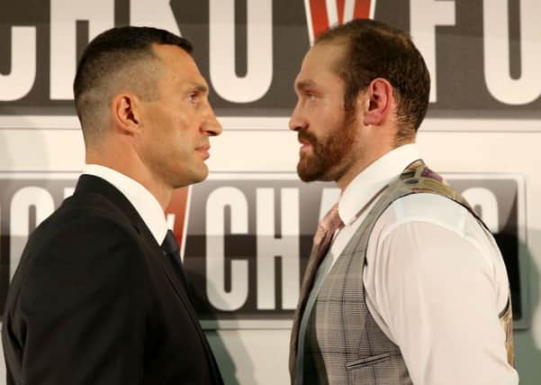 Wladimir Klitschko, left, and Tyson Fury were due to meet in Manchester on 9 July. Picture: Simon Cooper/PA Wire