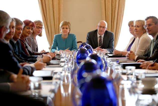 Nicola Sturgeon and John Swinney head an emergency meeting of the Scottish cabinet yesterday. Piture: Jane Barlow/PA