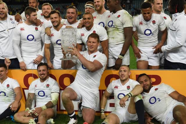 England's captain Dylan Hartley celebrates with the Cook Cup following the third Test win over Australia in Sydney. Picture: Saeed Khan/AFP/Getty Images