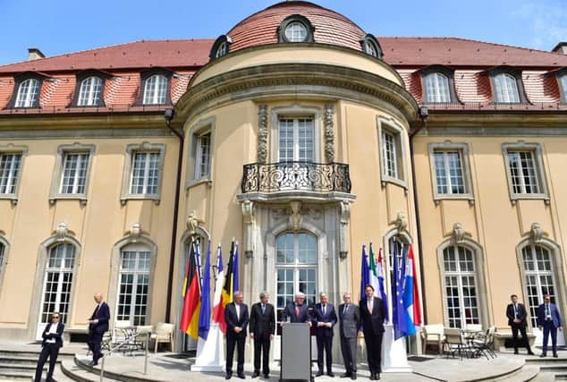 Left to right: Luxembourgs Jean Asselborn, Italys Paolo Gentiloni, Germanys Frank-Walter Steinmeier, Belgiums Didier Reynders, Frances Jean-Marc Ayrault and the Netherlands Bert Koenders 
in Berlin yesterday. 
Picture: AFP/Getty Images
