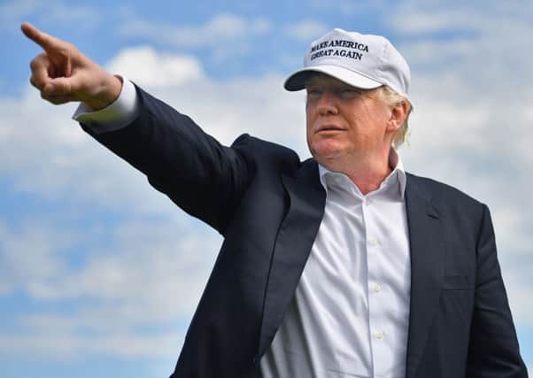 The presumptive Republican nominee was asked to clarify his proposed ban on Muslim immigration during a visit to his golf resort in Aberdeenshire. Picture: Getty