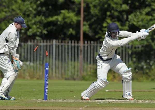 Tom Dryden of Heriot's is bowled but the Edinburgh club beat Falkland. Picture: Neil Hanna