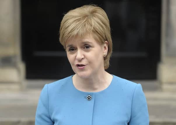 First Minister Nicola Sturgeon is presiding over a deficit in Scotlands finances of Â£14.9 billion and its current share of the EU membership fee is Â£1.6 billion. Picture: Neil Hanna