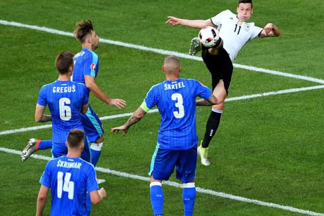 Julian Draxler scores Germanys third goal against Slovakia. Picture: Getty