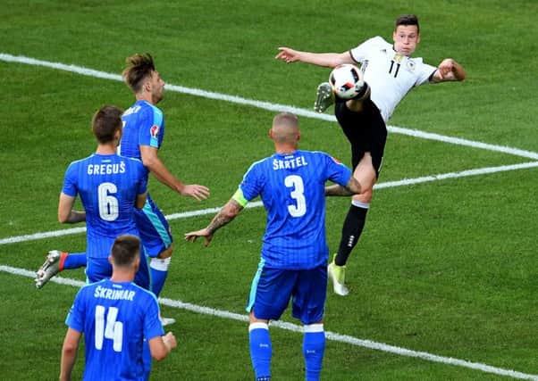Julian Draxler scores Germanys third goal against Slovakia. Picture: Getty