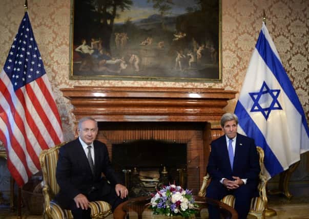 Prime Minister Benjamin Netanyahu (L) meets US Secretary of State John Kerry on June 27
Picutre Getty Images