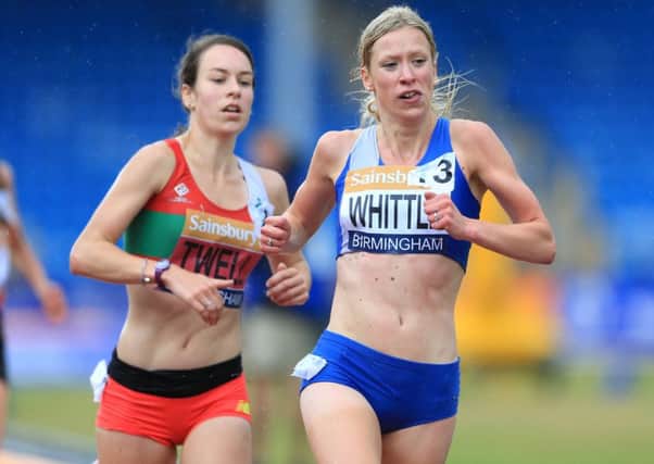 Steph Twell and Laura Whittle, right, during the women's 5000 metres final in Birmingham. Picture: Nigel French/PA
