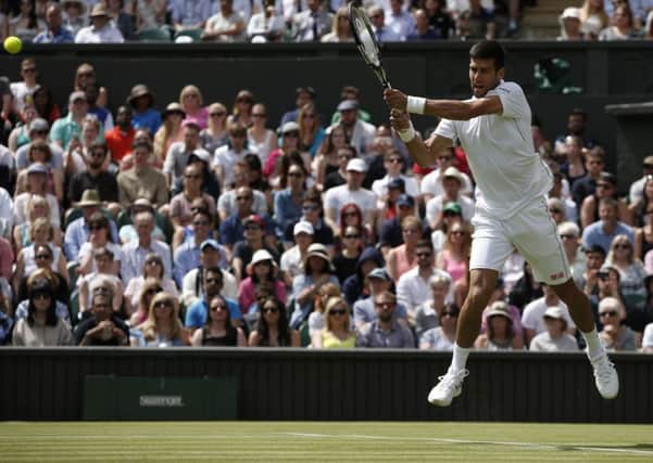 Novak Djokovic  on his way to winning the first set 6-0 against James Ward. Picture: Adrian Dennis/AFP