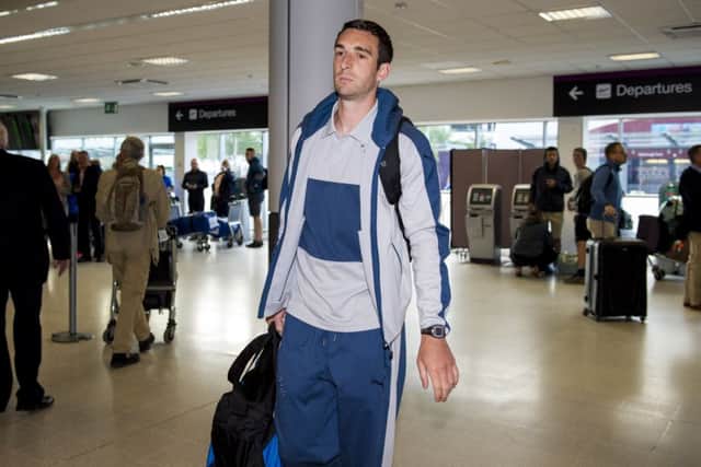 Lee Wallace was at Edinburgh Airport yesterday as Rangers flew to USA for their training camp. Picture: SNS