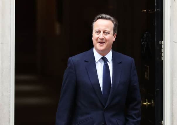 David Cameron emerges from Downing Street after a cabinet meeting. Picture: Getty Images