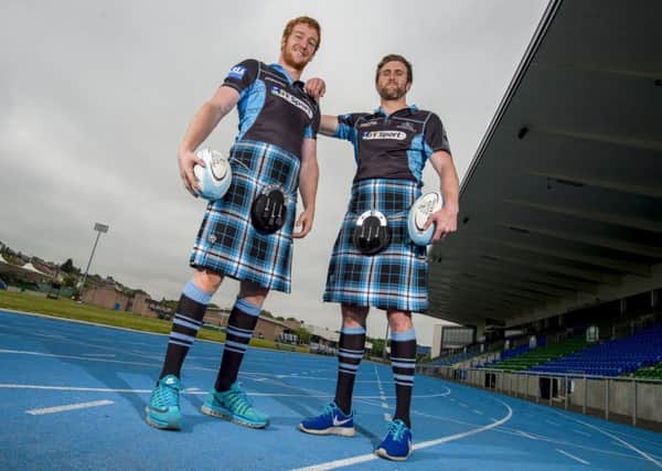 Rob Harley (left) and Richie Vernon model kilts in the club's new tartan. Picture: SNS Group