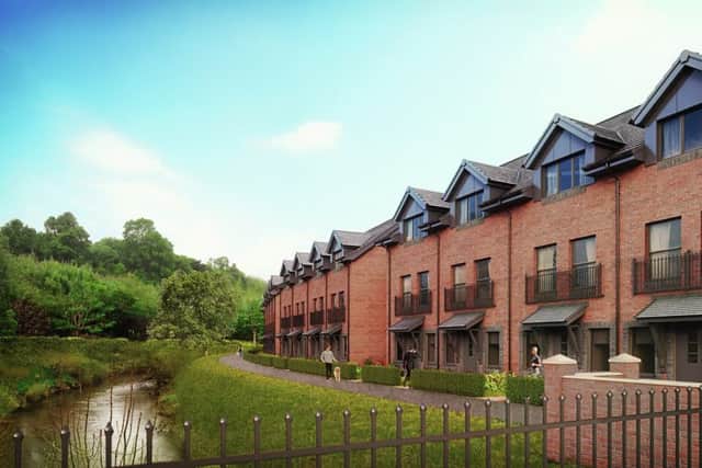 The townhouse design was inspired by the mill buildings formerly on the site