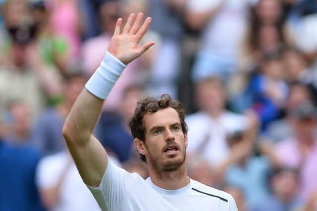 Andy Murray salutes the crowd after beating Liam Broady in straight sets in the first round at Wimbledon. Picture: Glyn Kirk/AFP/Getty Images