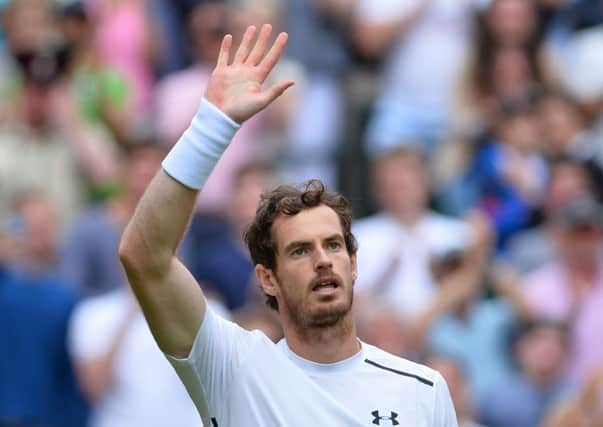 Andy Murray salutes the crowd after beating Liam Broady in straight sets in the first round at Wimbledon. Picture: Glyn Kirk/AFP/Getty Images