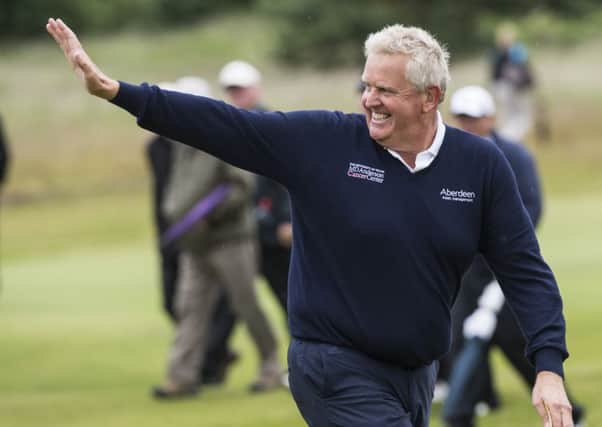 Colin Montgomerie thanks the crowd after finishing his first round at Gailes Links. Picture: Christian Cooksey/R&A/R&A via Getty Images