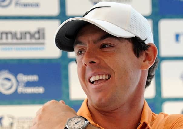 Rory McIlroy brushes an insect off his shoulder during a press conference before the  Open de France. Picture: Richard Martin-Roberts/Getty
