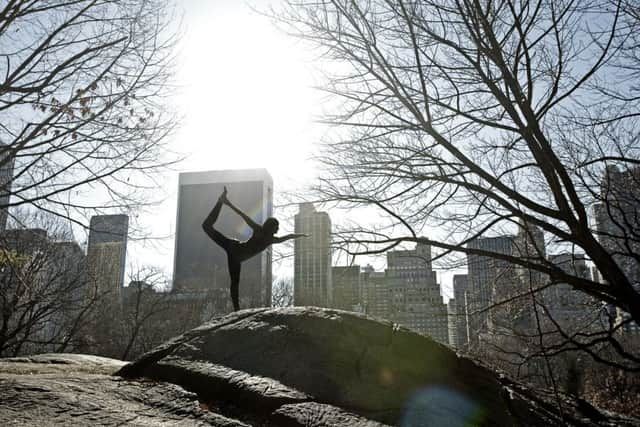 Yoga in Central Park is one of the best ways to kick off the weekend. Pic: TSPL