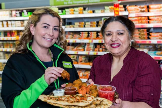 Asda buying assistant June Rose with Shaheen Unis. Picture: Ian Georgeson