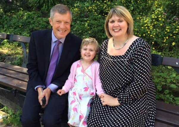 Agatha with MP Willie Rennie and her mother Karen King.
