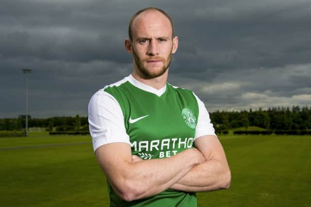 Hibernian's David Gray models the club's new away kit for the forthcoming season. Picture: SNS