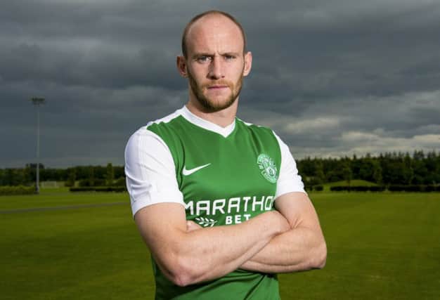 Hibernian's David Gray models the club's new away kit for the forthcoming season. Picture: SNS