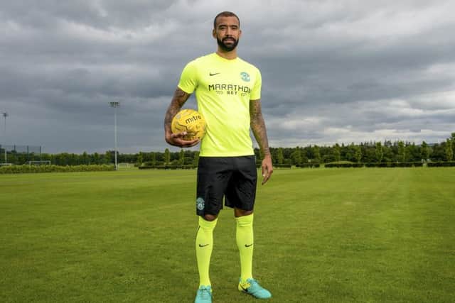 Hibernian's Liam Fontaine models the club's new away kit. Picture: SNS