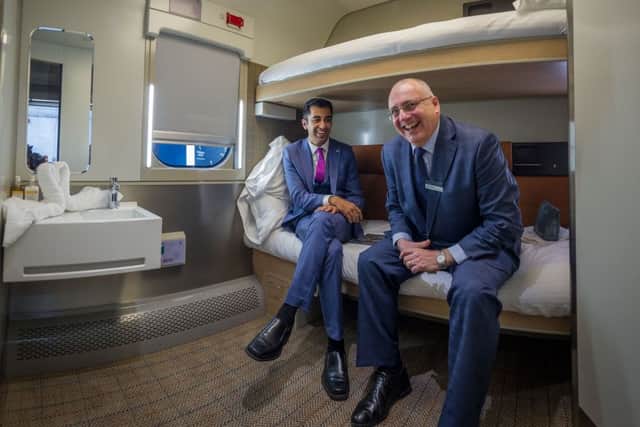 Transport Minister Humza Yousaf with Caledonian Sleeper managing director Peter Strachan in a model of the new berths. Picture: Steven Scott Taylor