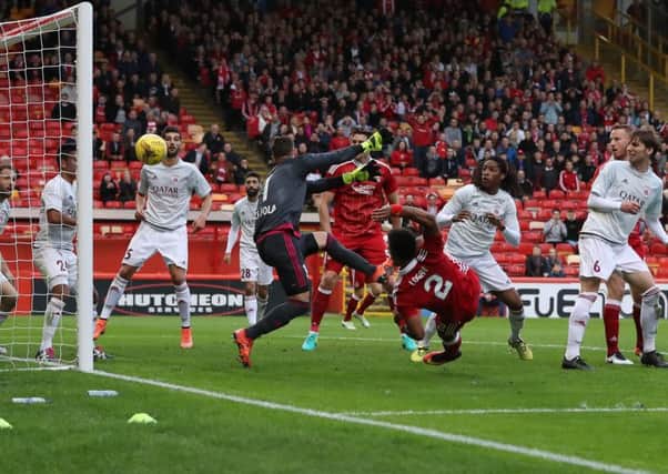 Shay Logan scores the opening goal in Aberdeens 3-1 Uefa Europa League first qualifying round, first leg match against Fola Esch. Picture: Ian MacNicol/Getty