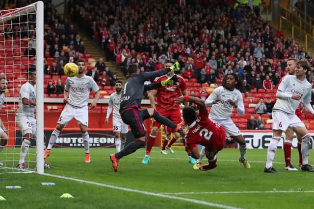 Shay Logan scores the opening goal in Aberdeens 3-1 Uefa Europa League first qualifying round, first leg match against Fola Esch. Picture: Ian MacNicol/Getty
