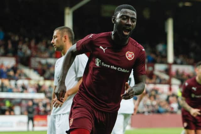 Prince Buaben celebrates scoring his penalty for Hearts. Picture: Toby Williams