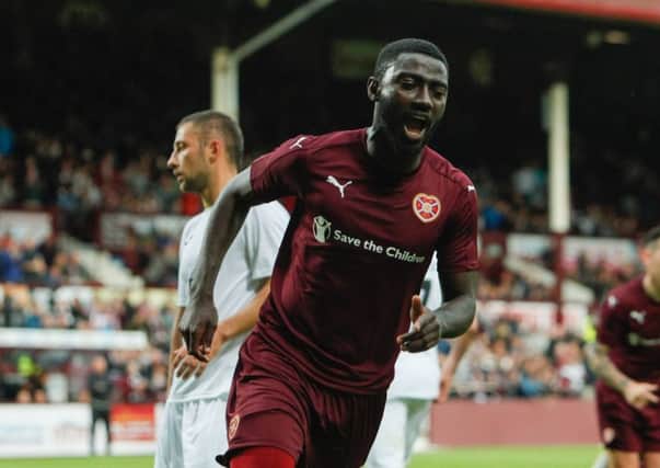 Prince Buaben celebrates scoring his penalty for Hearts. Picture: Toby Williams