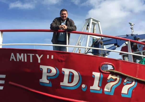Peterhead veteran Jimmy Buchan aboard the trawler Amity II. Picture: Contributed