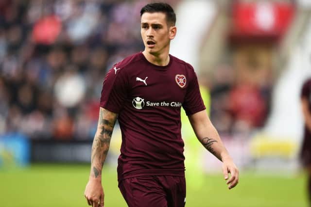 Jamie Walker had little joy, either on the left flank or through the middle. Picture: SNS