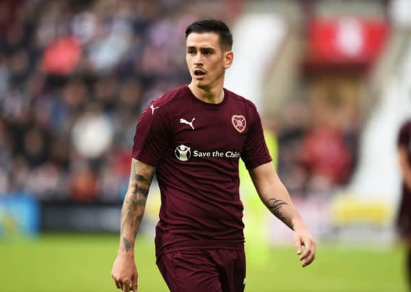 Jamie Walker had little joy, either on the left flank or through the middle. Picture: SNS
