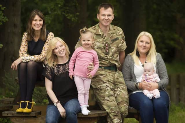 From left: WES chief operating officer Carolyn Currie, Aimee King and her daughter Sophia, unit welfare officer Scott Shaw and Sam Craig with Aimee's daughter Emily. Aimee and Sam plan to start their own business, running the cafe at Scots Corner Community Centre. Picture: Malcolm Cochrane
