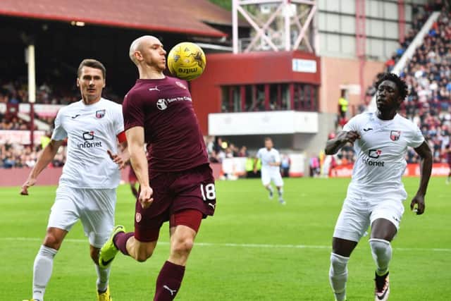 Hearts' Conor Sammon in action against Infonet. Picture: SNS