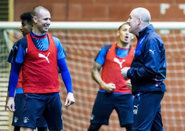 Rangers' Kenny Miller, left, has tipped manager Mark Warburton to be a future England manager. Picture: SNS