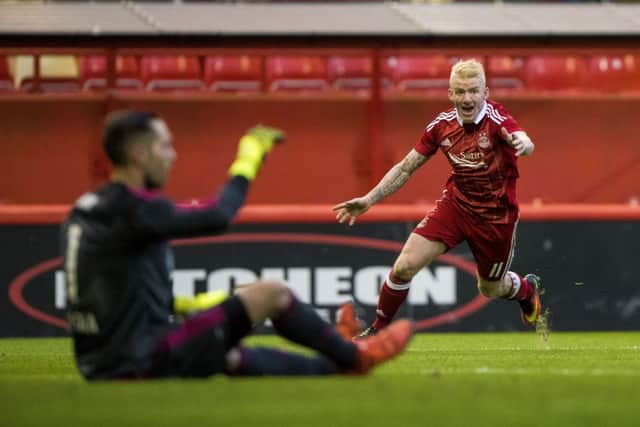 Aberdeens Jonny Hayes celebrates after seeing Adam Rooney score their third goal against CS Fola Esch at Pittodrie.  Picture: Craig Watson/PA