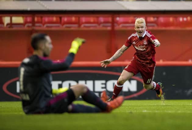 Aberdeens Jonny Hayes celebrates after seeing Adam Rooney score their third goal against CS Fola Esch at Pittodrie.  Picture: Craig Watson/PA