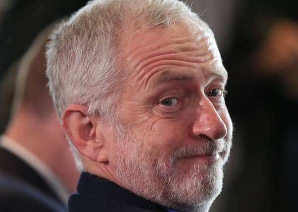 Corbyn waits to deliver a speech on the findings of the Labour anti-Semitism inquiry last week. Picture: Jonathan Brady/PA