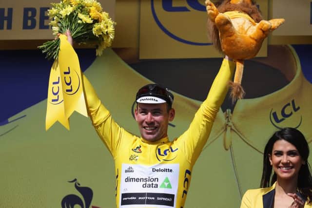 Mark Cavendish in the yellow jersey for the first time after winning a sprint for the line. Picture: Getty Images