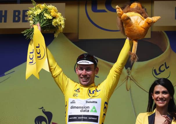 Mark Cavendish in the yellow jersey for the first time after winning a sprint for the line. Picture: Getty Images
