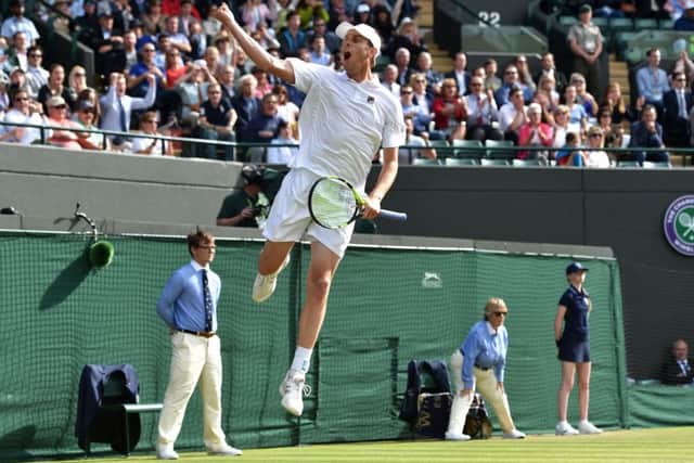 Sam Querrey celebrates his sensational third round win over Novak Djokovic. Picture: Glyn Kirk/AFP/Getty Images