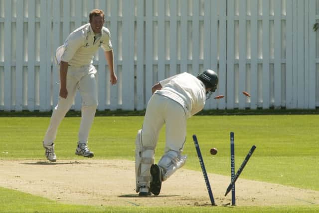 Adrian Neill of Heriots bowls out Carltons Rory McCann in the 12th over at Goldenacre, Edinburgh.  Picture: Andrew OBrien