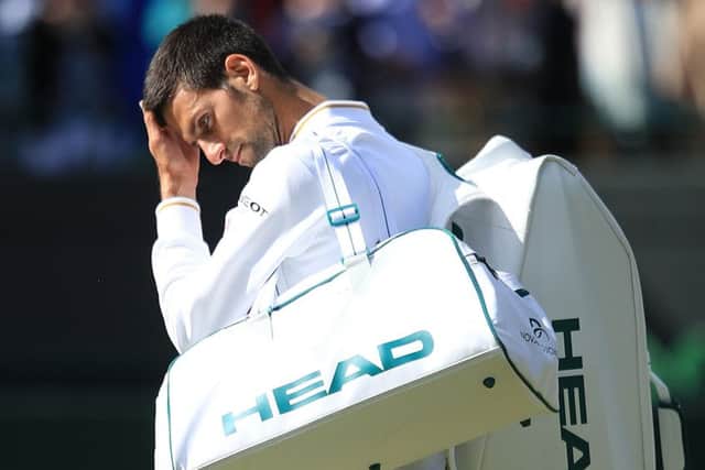 Novak Djokovic leaves the court after his 7-6 (8/6) 6-1 3-6 7-6 (7/5) to American 28th seed Sam Querrey. Picture: John Walton/PA