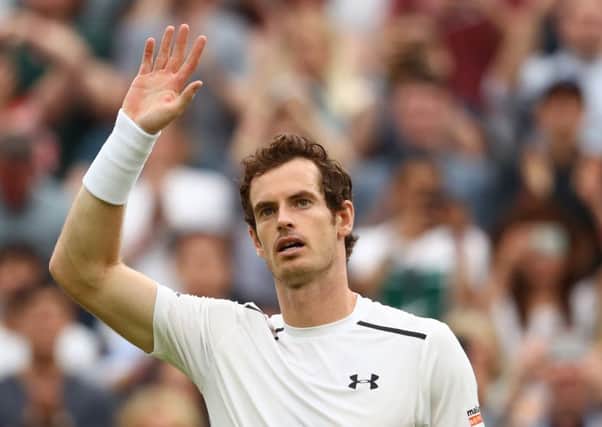 Andy Murray waves to the crowd after his victory over Australian John Millman. Picture: Getty Images