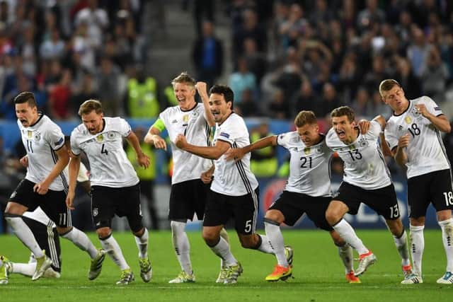 Germany players celebrate their penalty shoot-out win over Italy in the Euro 2016 quarter-final. Picture: Laurence Griffiths/Getty Images