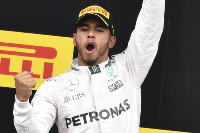 Lewis Hamilton was booed when he climbed on the podium to celebrate winning the Austrian GP. Picture: AP